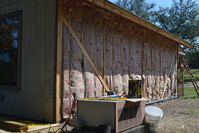 We went from old R13 insulation to R15 plus R5 foam board.  It's as insulated as we can make it with today's technology.