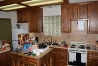 Glass block window to block view of the nasty main house.  The old counter top was a fake wood laminate.