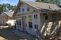 I installed a ledger board for a new awning over the front eventually.  And new windows of course.